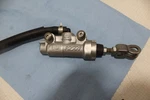 Suzuki RM80 Rear Back Brake Master Cylinder 69600-02B40. Fixed Price $21.00.