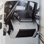 Harley Davidson Chrome Oil Cooler Cover 62995-04. Fixed Price $100.00.